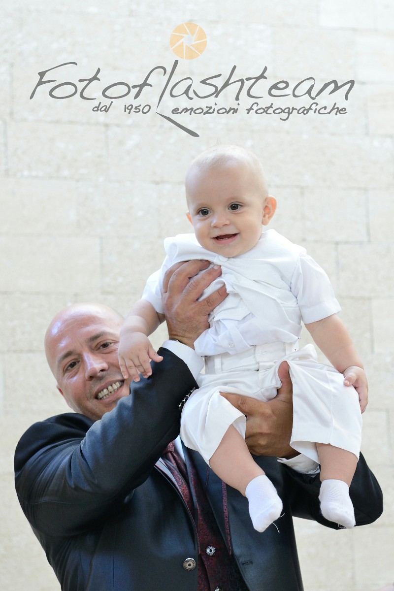 Papà e bambino Fotografo Battesimo Roma Fotoflash
